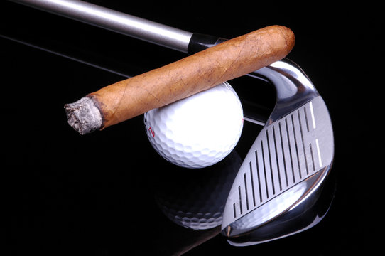 Cigar On Golf Ball And Club