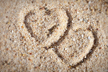 Beach background with hearts drawing