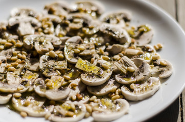 carpaccio of mushrooms with pine nuts and thyme 
