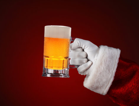 Santa Holding a Mug of Beer