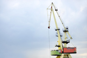 Fototapeta premium Industrial port cranes for containers
