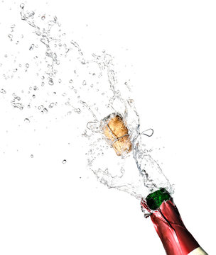 bottle of champagne popping its cork and splashing