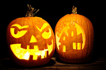 Halloween pumpkin head jack lantern with scary evil faces spooky