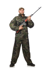 Young man in soldier uniform holding gun isolated on white