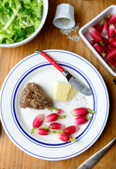 plate with vegetables on an  wooden table