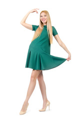 Beautiful pregnant woman in green dress isolated on white