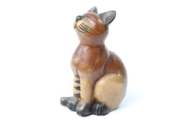 Thailand carved wooden cats on a white background.