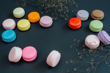 Macarons on black with copy space, Vintage tone