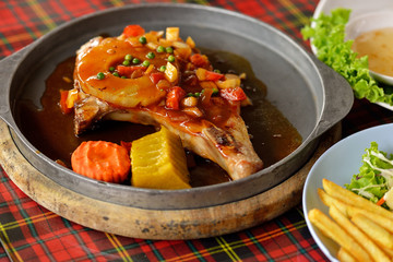 Pork Steak with Vegetables. Isolated on background