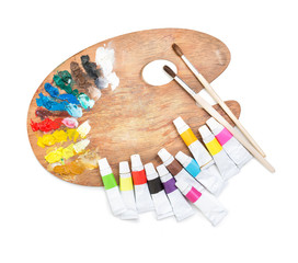 Fototapeta premium palette with tubes of paint