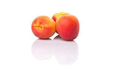 Ripe apricot over white background