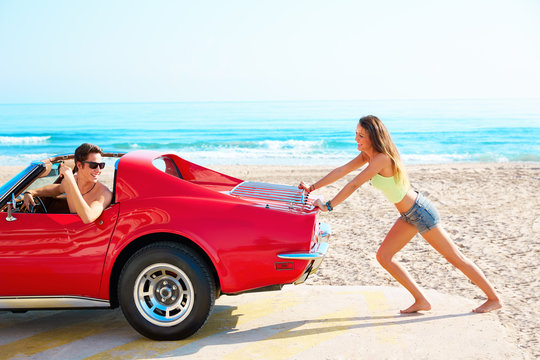 Girl Pushing A Broken Car On The Beach Funny Guy