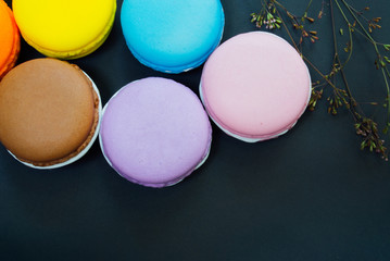 Macarons on black with copy space, Vintage tone