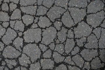 crack background texture of rough asphalt