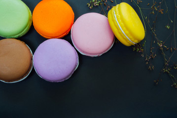 Macarons on black with copy space, Vintage tone