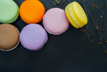 Macarons on black with copy space, Vintage tone