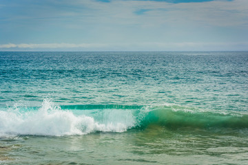Fototapeta premium Wave in the Pacific Ocean, seen at Newport Beach, California.