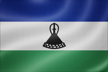 Lesotho flag on the fabric texture background