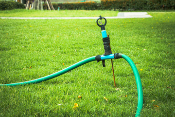 Old sprinkler modify on grass