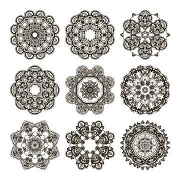 Round mehndi henna patterns drawn doodle set mandalas.
