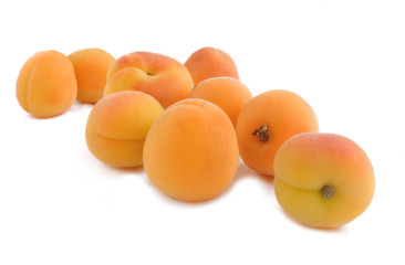 Fresh apricots isolated on white background