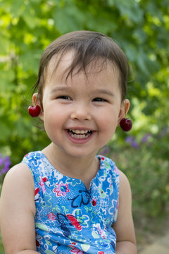 Sweet Little Girl With Cherry Earrings