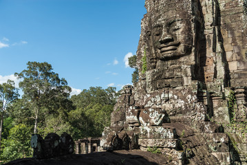 buddha statue inside a prasat in the complex of the bayon in the archaeological angkor thom place in siam reap, cambodia