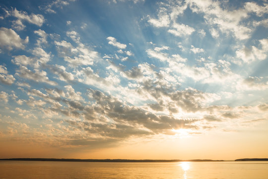 Fototapeta Tranquil lake scene at sunrise