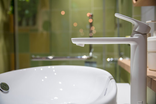 Modern faucet and wash basin in luxury bathroom 
