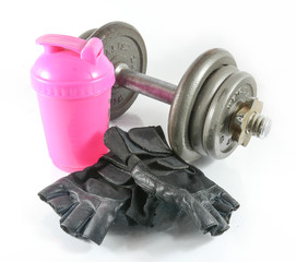  dumbbells with workout gloves and water bottle  isolated on white background.
