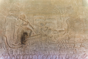 bas-reliefs representing the army in march in the archaeological place of angkor wat in siam reap, cambodia