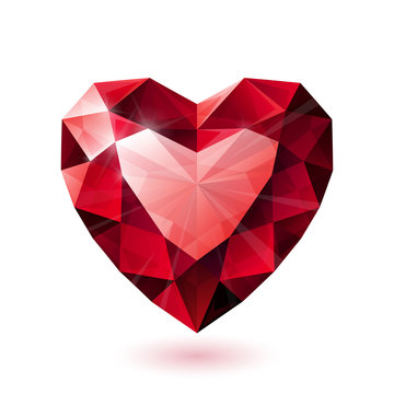 Shiny isolated red ruby heart shape on white background