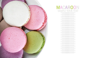 Sweet and colourful french macaroons on white background