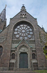 Fototapeta na wymiar Falkenberg church built in neo-Gothic style with rosary windows, in 1892, Falkenberg, Sweden.