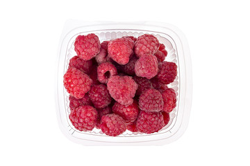 Box or punnet of fresh ripe organic raspberries isolated on white background
