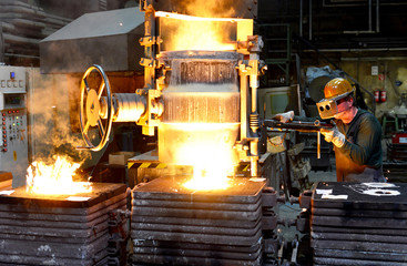Industrial workers in a foundry // Stahlgiesserei 