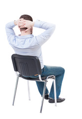 back view of business man sitting on chair.  businessman watchin