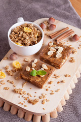 oat bar on wooden board, vertical