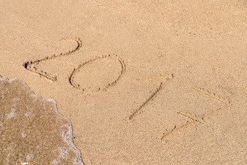 Year 2017 Written On Beach Sand