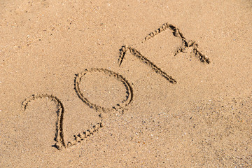 Year 2017 Written On Beach Sand