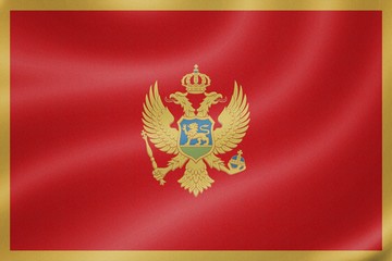 Montenegro flag on the fabric texture background