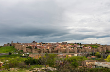 Fototapeta na wymiar Cityscape and medieval Walls of Avila in Spain