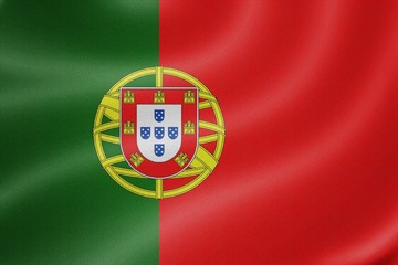 Obraz premium Portugal flag on the fabric texture background
