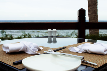 Outdoors decorated table with a sea view