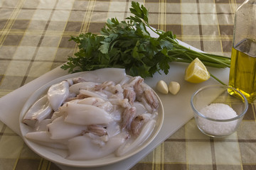Raw squid on a plate for cooking seafood