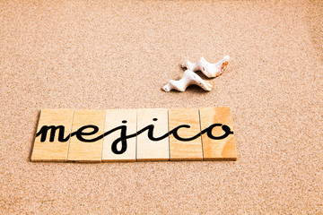 Words formed from small pieces of wood containing a sun and beach tourist destination, Mejico