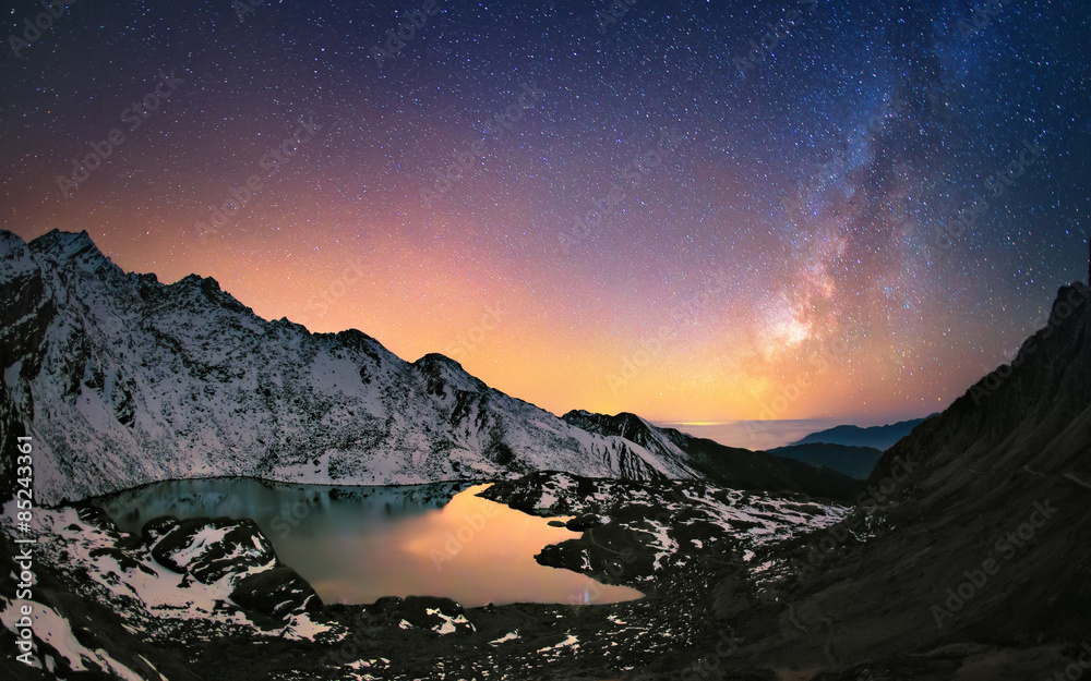 Wall mural milky way under the mountains