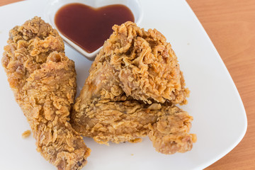  Fresh fried chicken on a wooden table