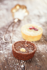 Chocolate  Mini Tartlets  on vintage wooden table