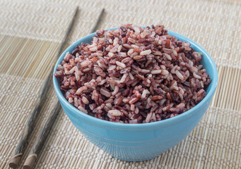 steamed rice in blue round bowl